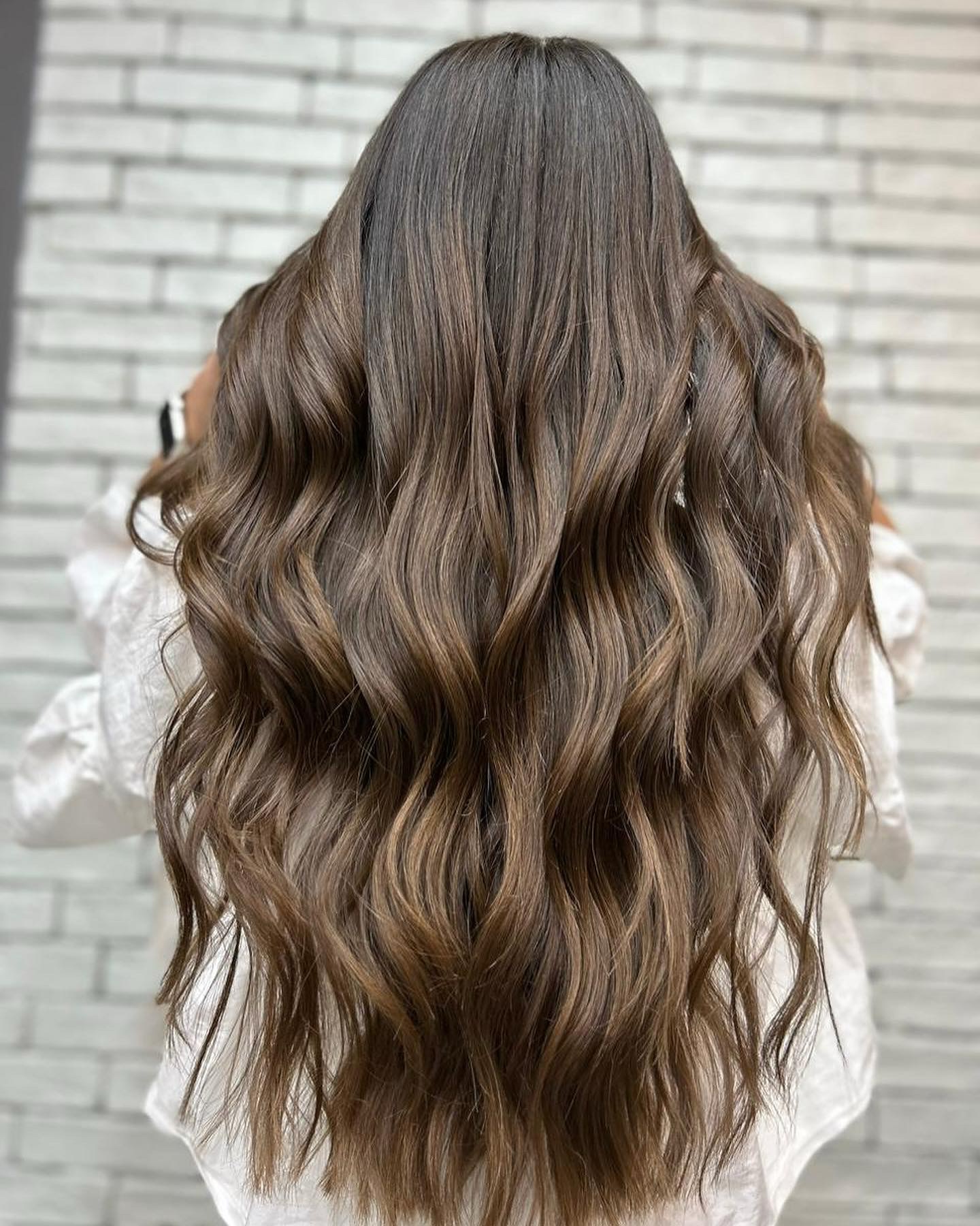 Chic Brunette Waves with Blonde Highlights