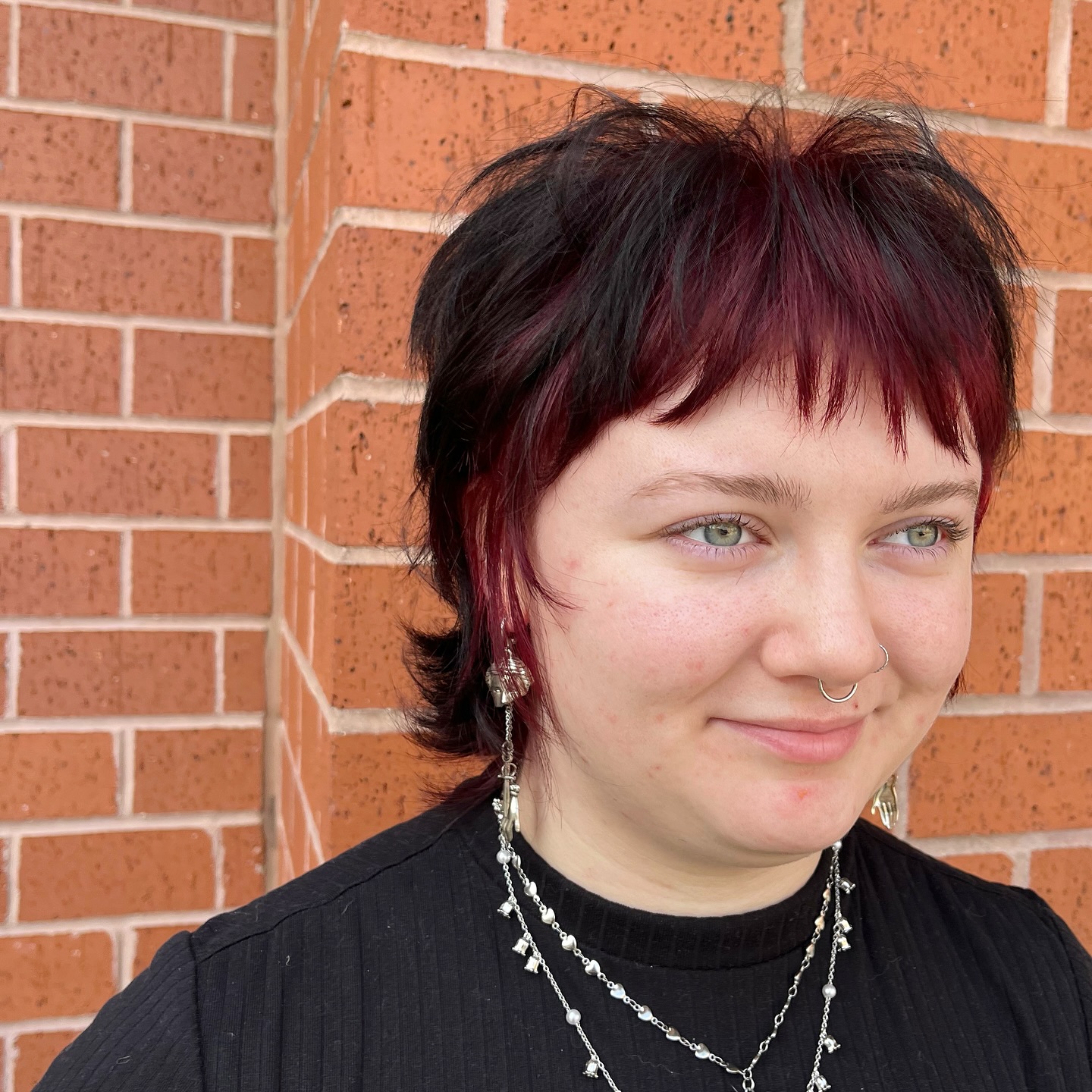 Edgy Short Shag with Bold Crimson Highlights
