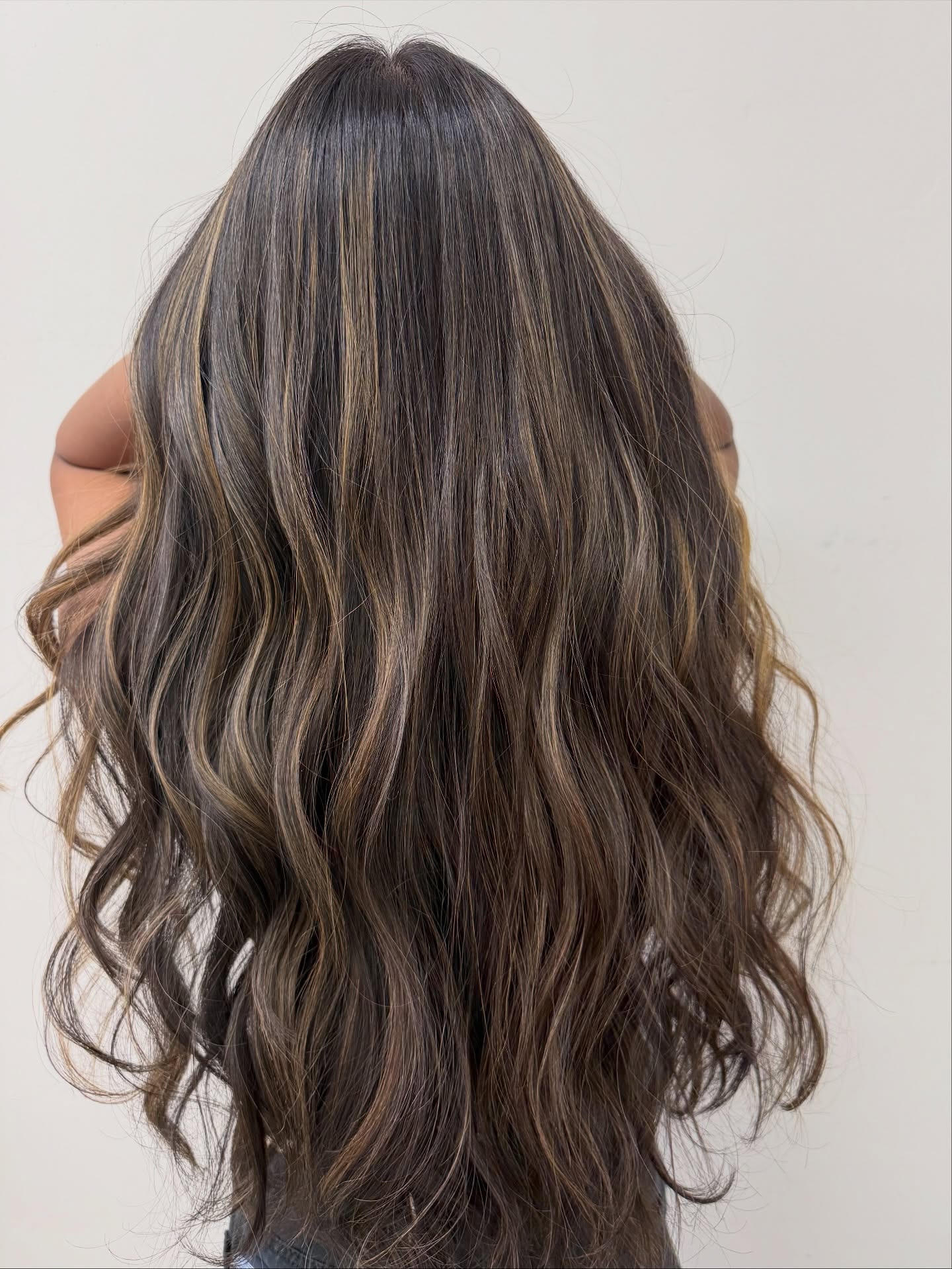 Luxurious Brunette Waves with Golden Blonde Highlights