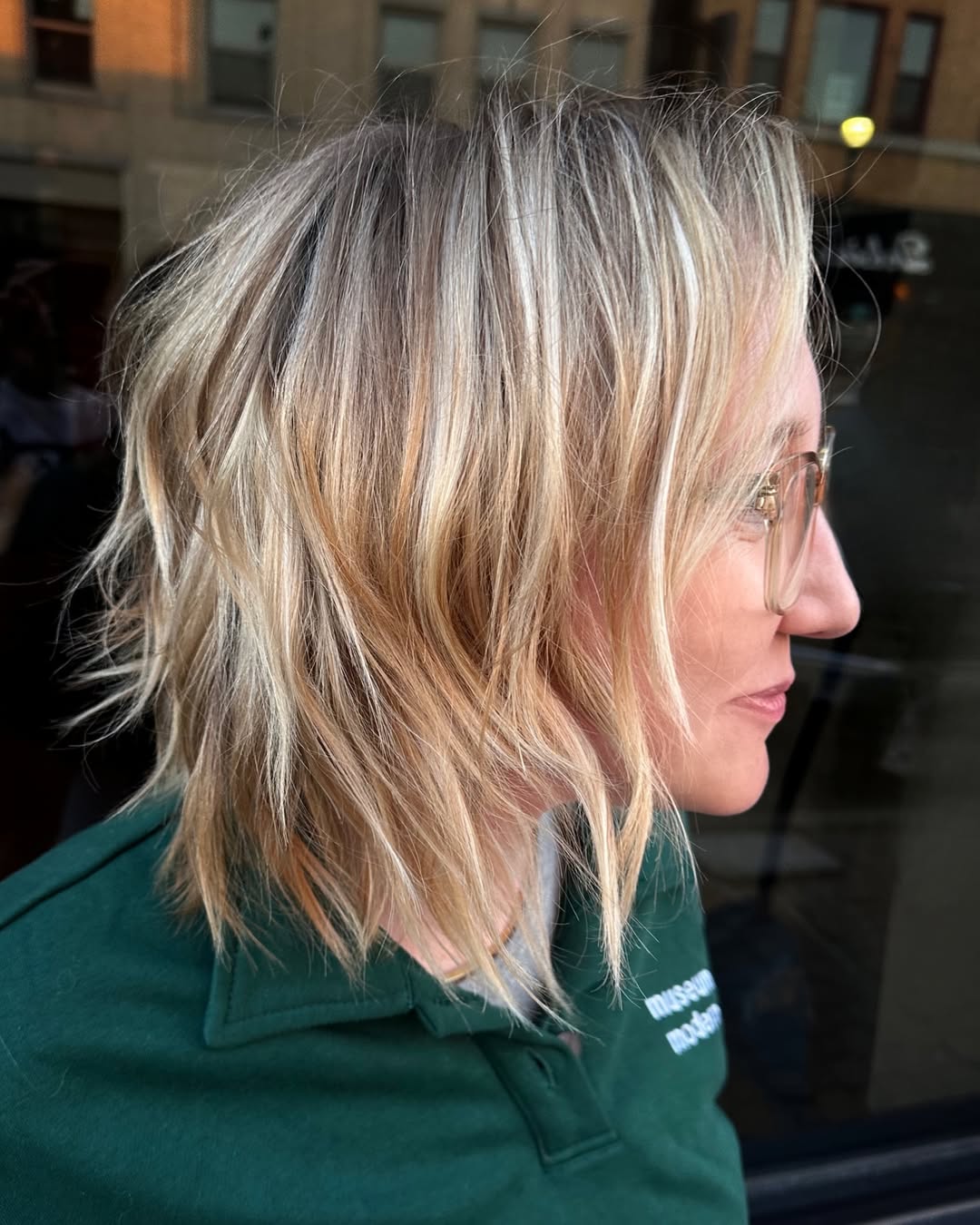 Textured Choppy Cut with Light Blonde Highlights