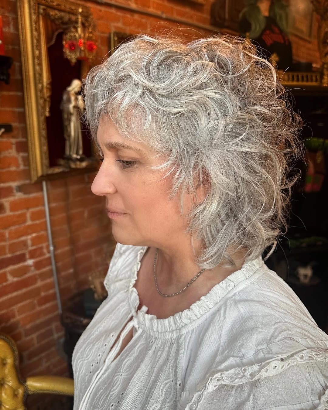 Textured Silver Curly Bob with Wispy Layers