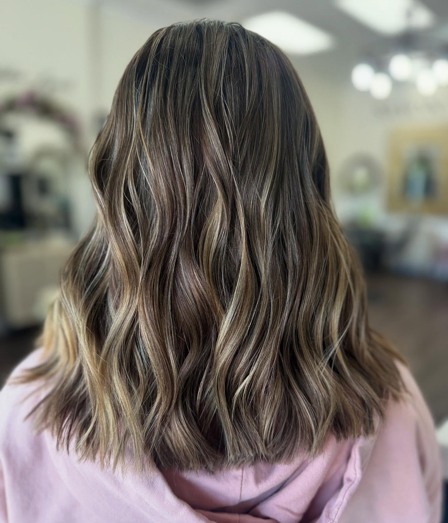 Warm Brunette Waves with Bright Blonde Highlights