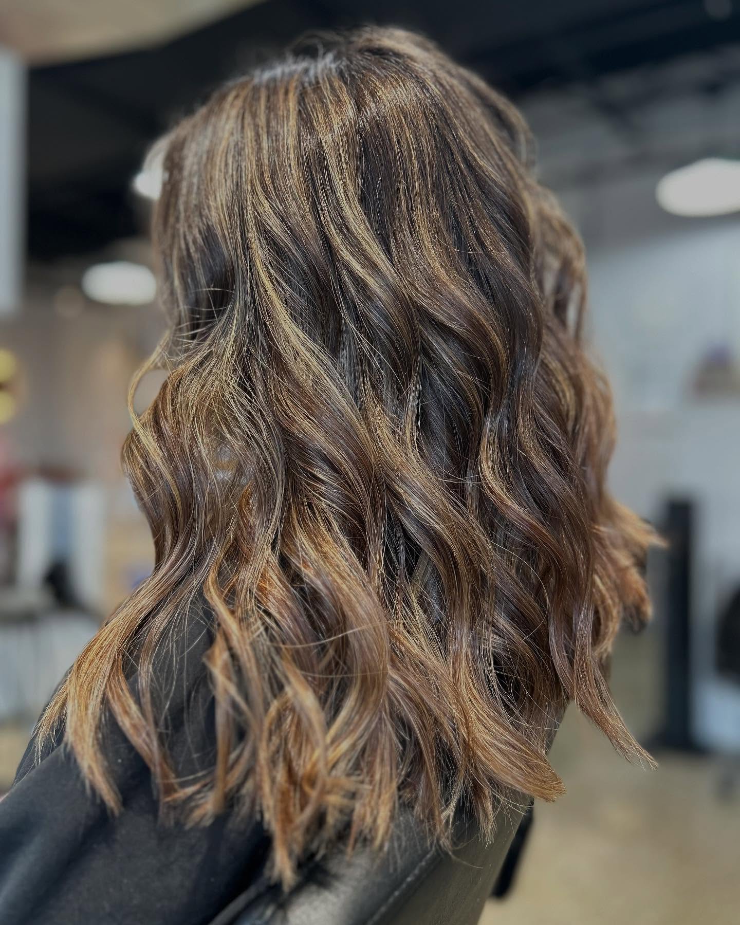 Warm Brunette Waves with Golden Blonde Highlights