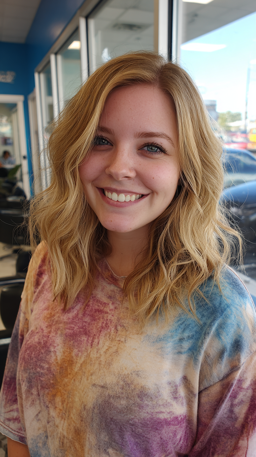 Lightly Textured Shoulder-Length Side Part with Beachy Waves