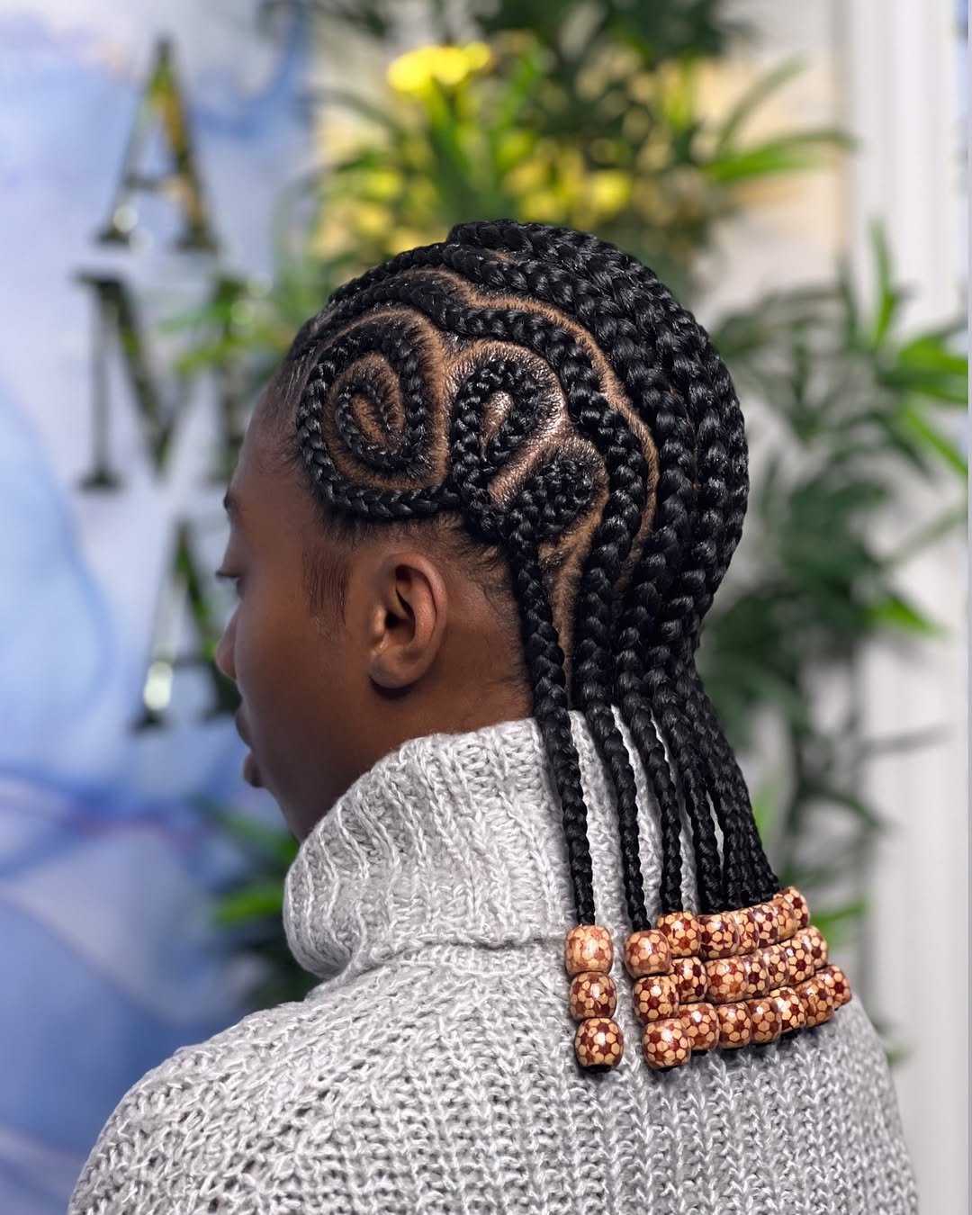 Elegant Braided Updo with Beaded Accents