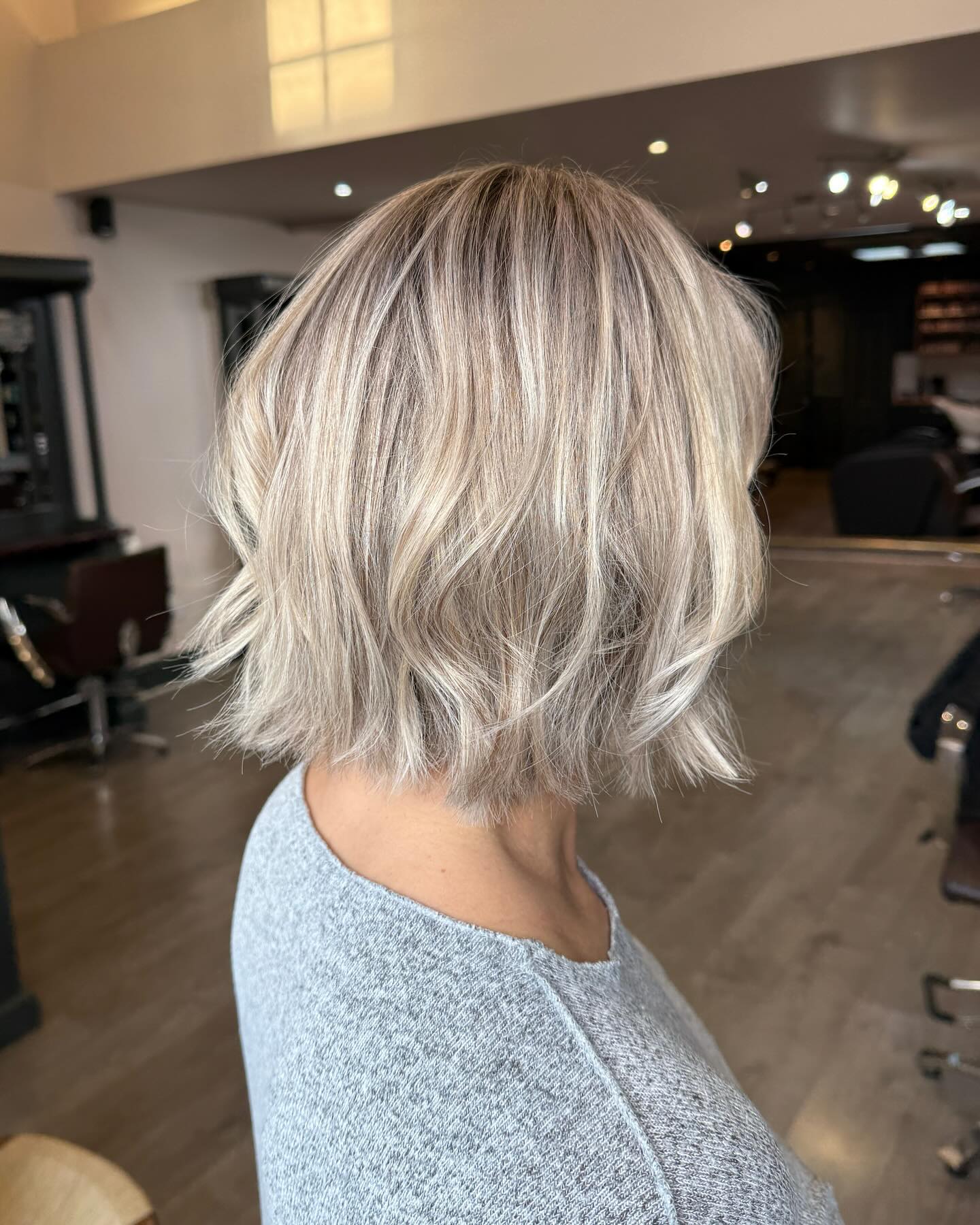 Effortlessly Tousled Blonde Bob with Subtle Layers