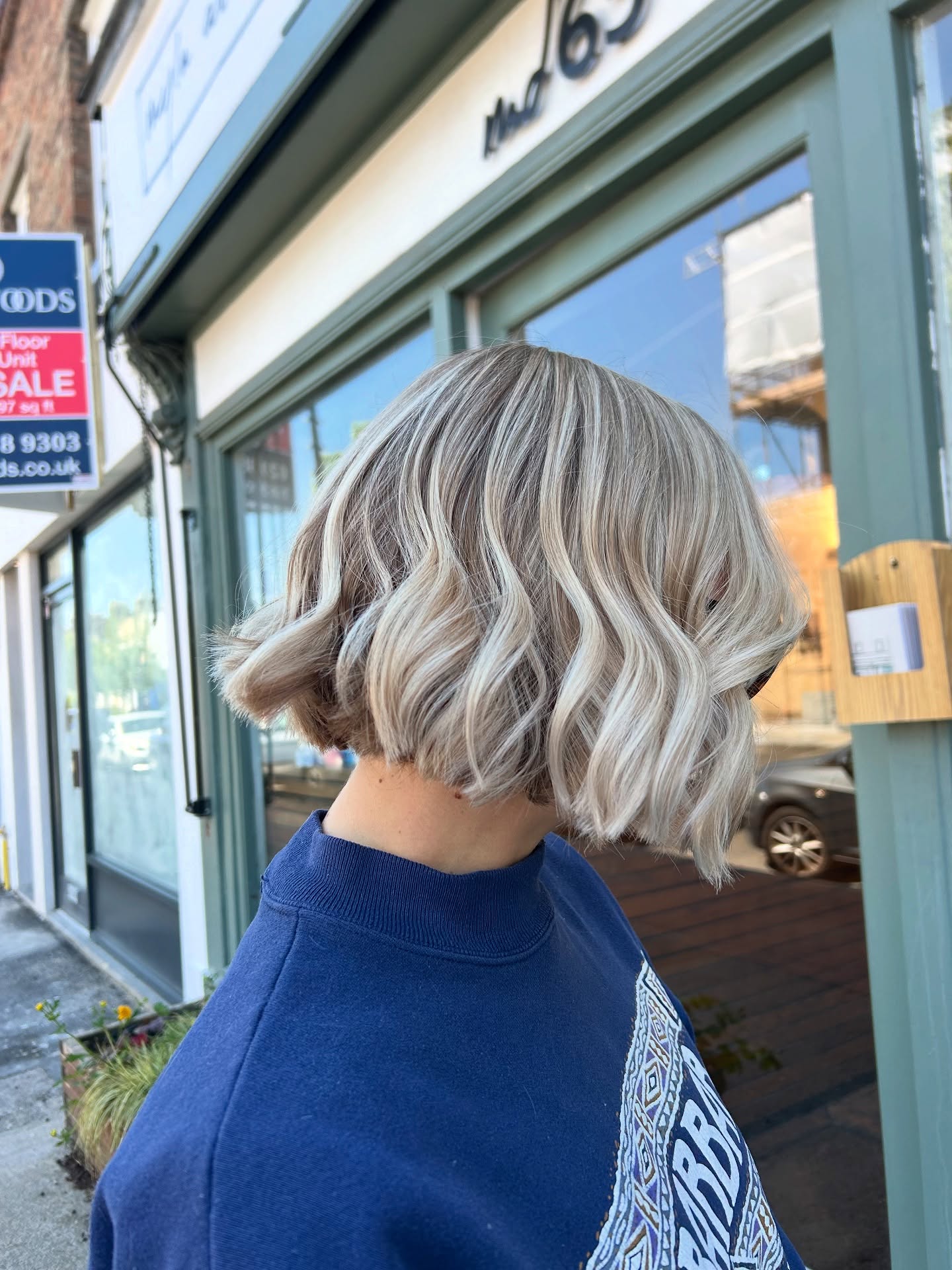 Playful Textured Blonde Bob with Soft Waves