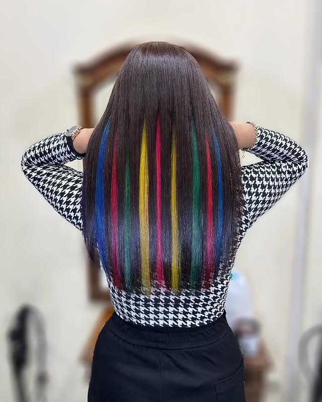 Bold Long Straight Hair with Vibrant Peekaboo Stripes