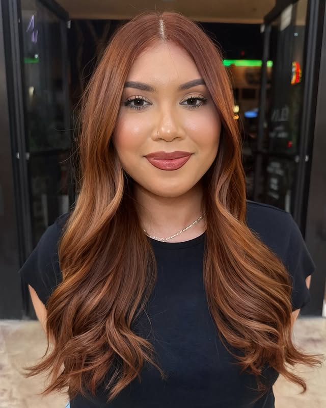 Glossy Copper Long Layers with Soft Curls