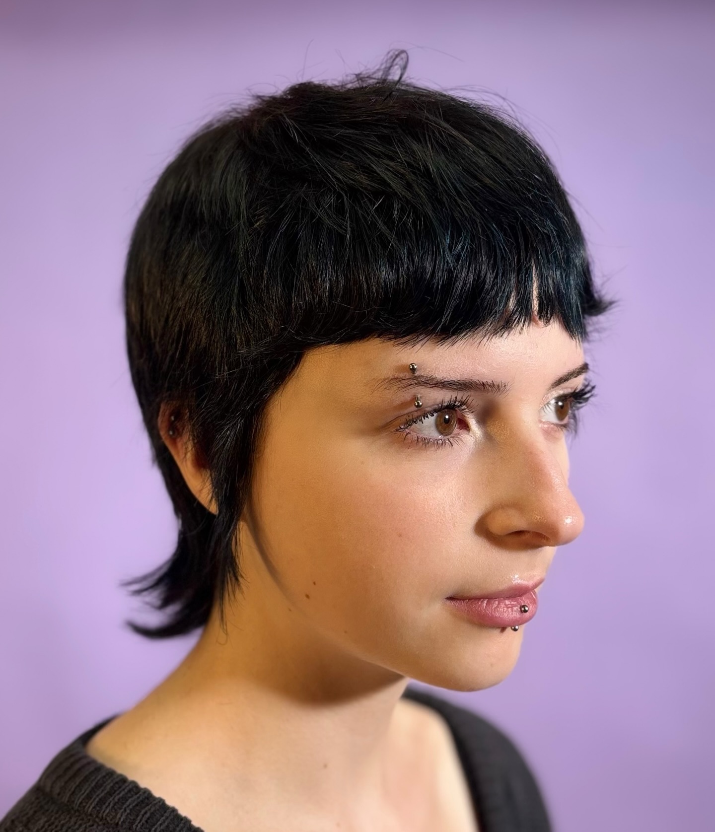 Playful Asymmetrical Pixie with Subtle Textured Layers