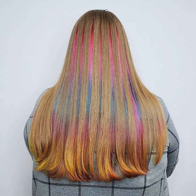 Radiant Long Hair with Playful Peekaboo Rainbow Highlights