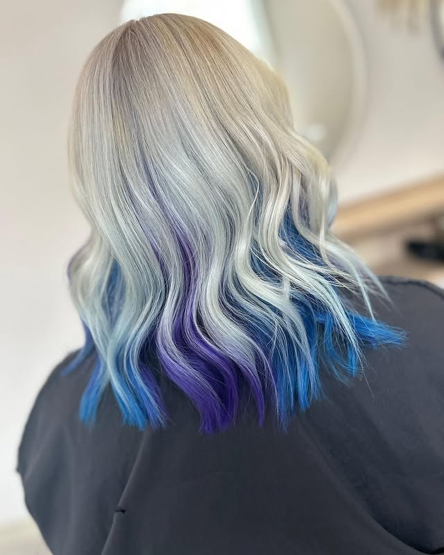 Stylish Long Hair with Vibrant Peekaboo Blue and Purple Ombre