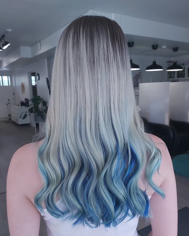Trendy Long Hair with Ocean Blue Peekaboo Highlights