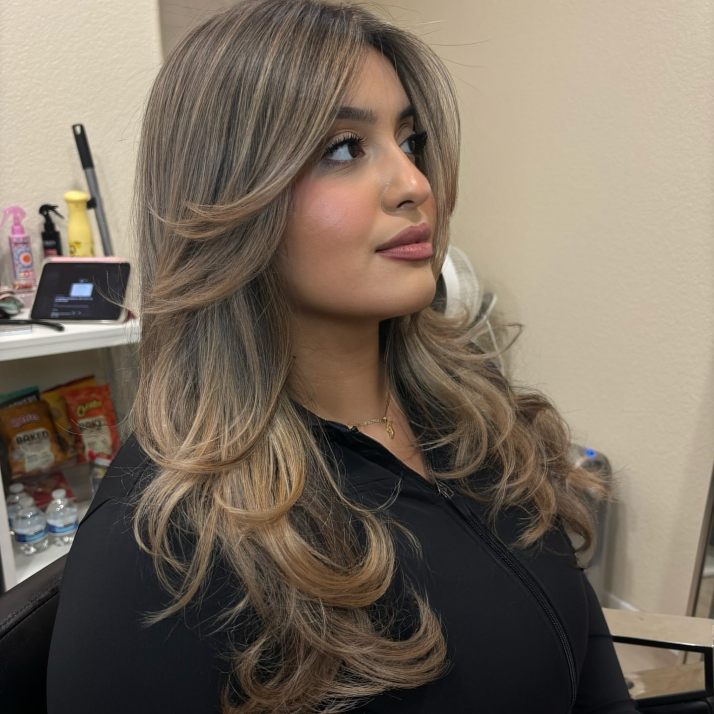 Glamorous Long Layered Cut with Subtle Highlights