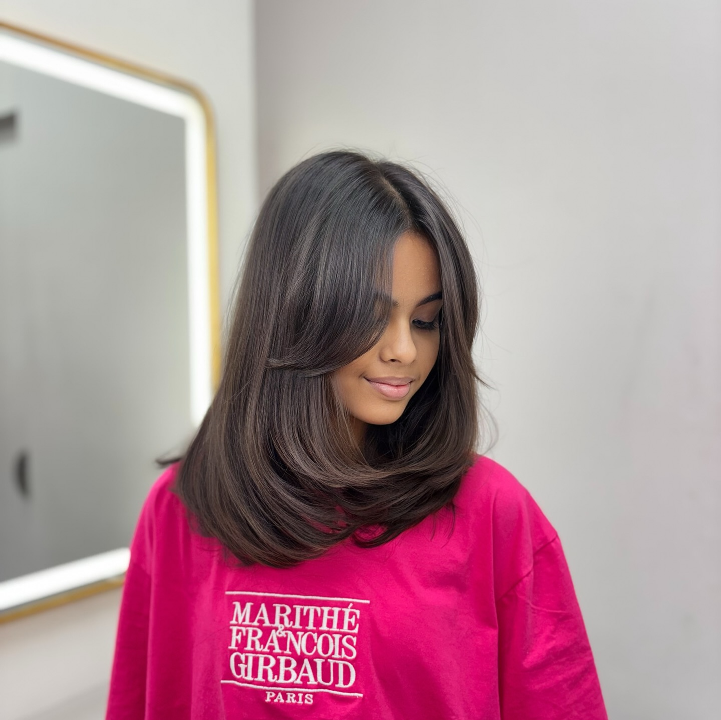 Sleek Layered Cut with Soft Face-Framing Layers