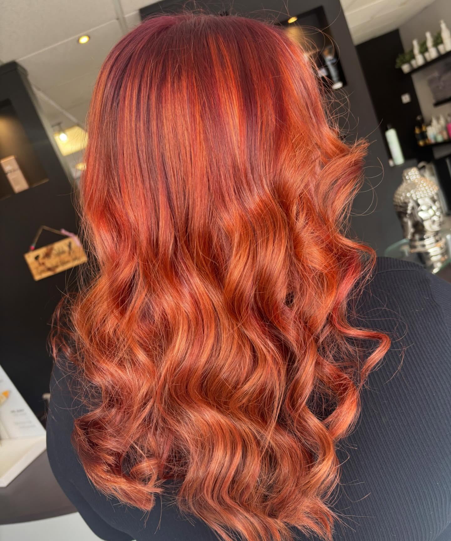 Dynamic Red Copper Balayage with Bouncy Waves