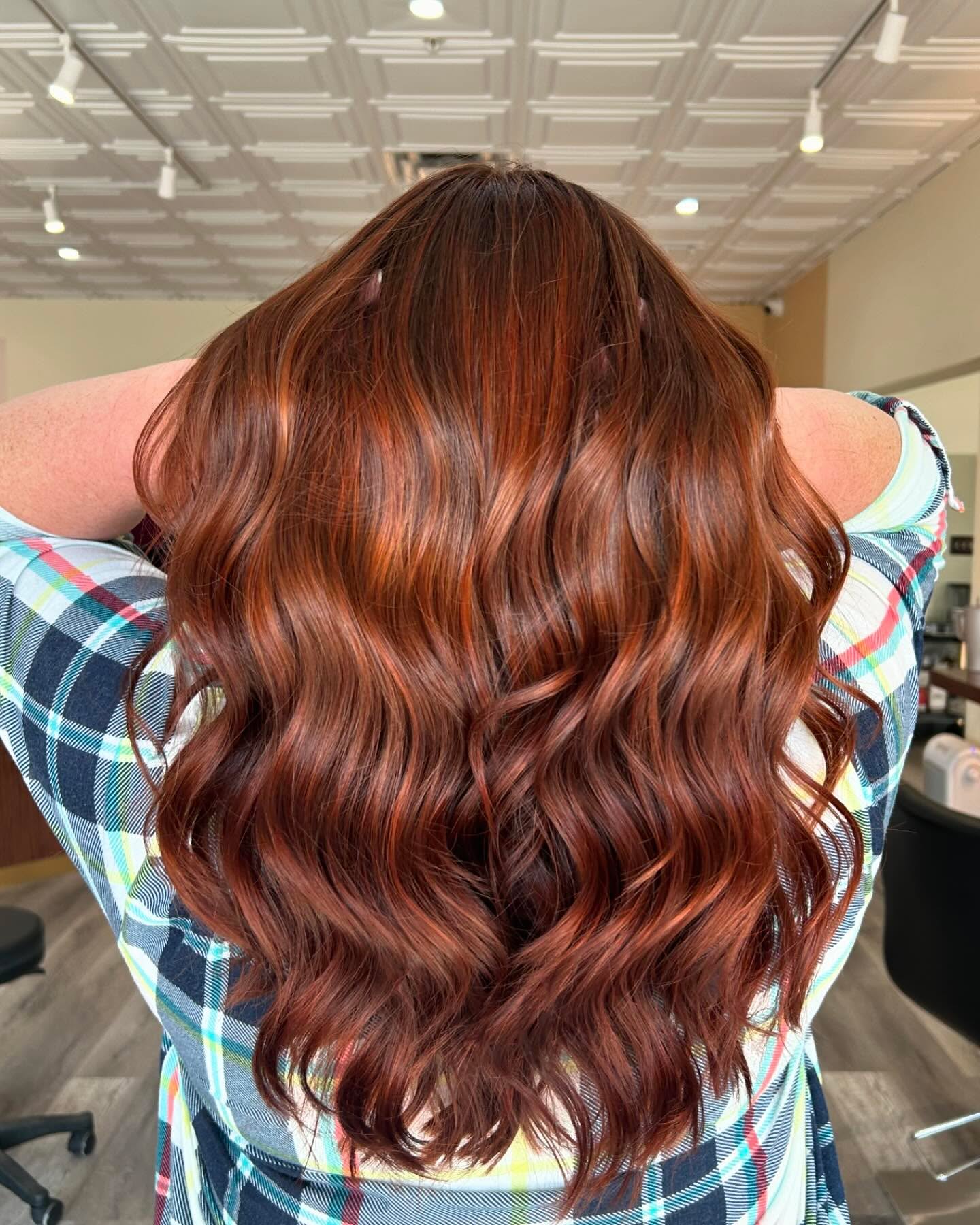 Radiant Red Copper Balayage with Soft, Defined Waves