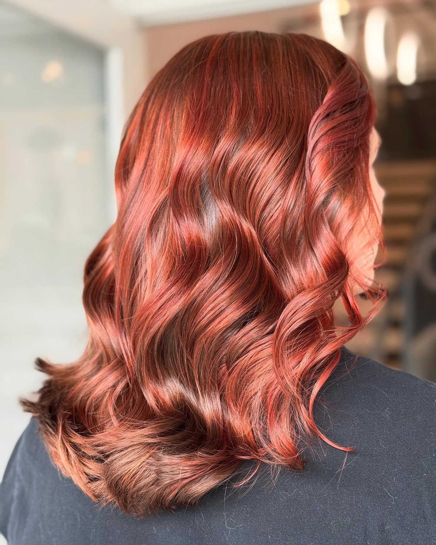Radiant Red Copper Balayage with Textured Waves