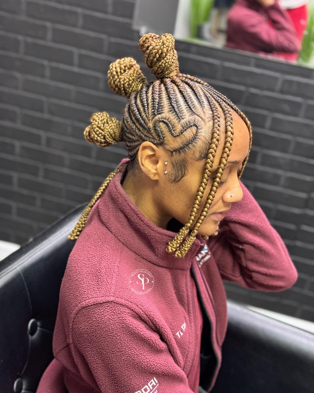 Artistic Triple Bun Braids with Defined Cornrow Design