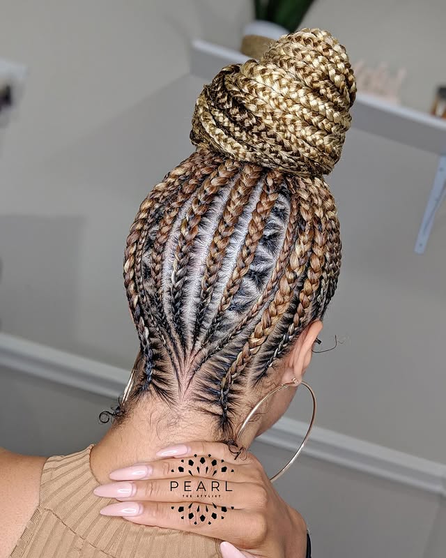 Stylish High Bun with Intricate Cornrows