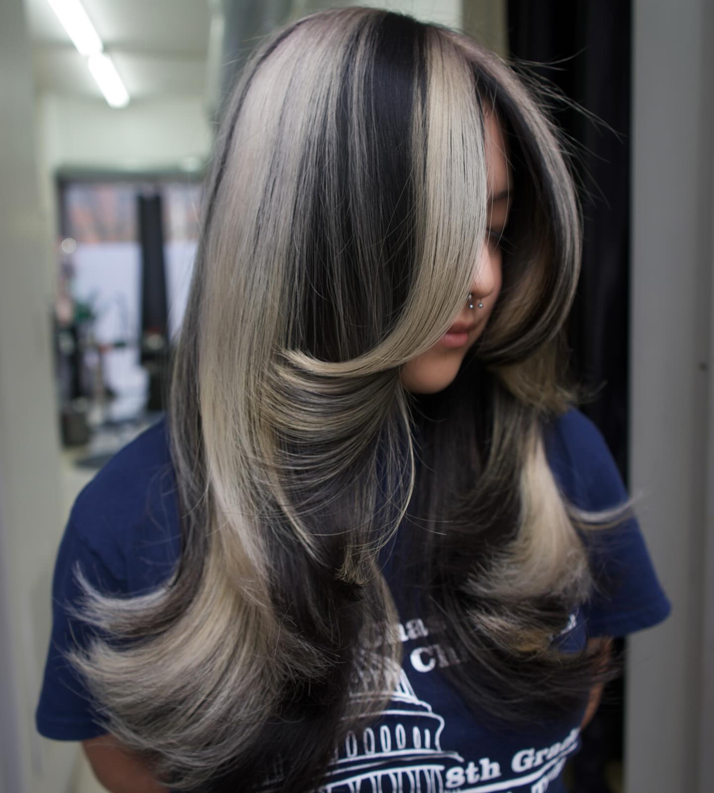 Glamorous Skunk Stripe Hair Color with Luxurious Layers