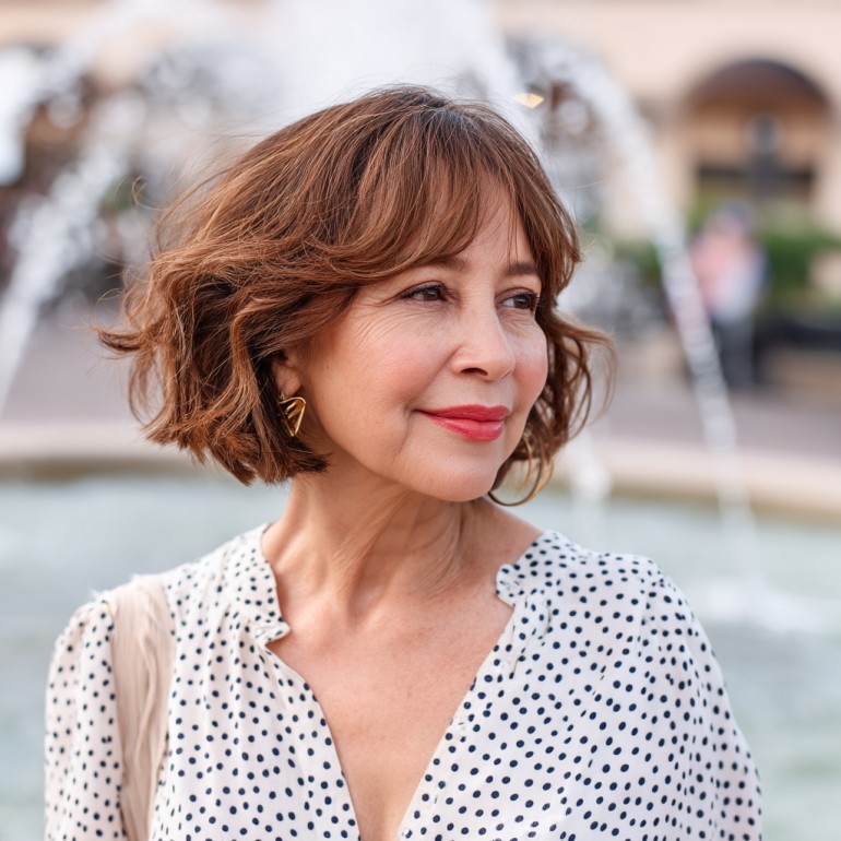 Chic Textured Curtain Bangs with Playful Waves