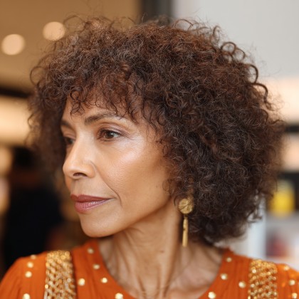Textured Butterfly Cut with Defined Curls for Women Over 50