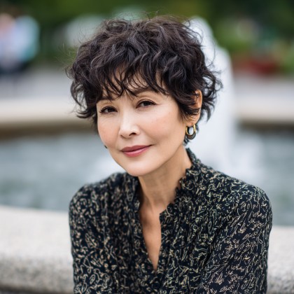 Textured Butterfly Cut with Soft Curls for Mature Women