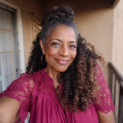 Elegant Curly Half-Up Hairstyle with Defined Curls