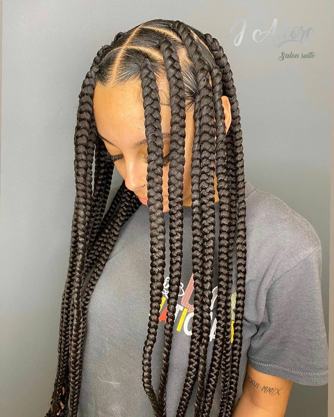 Chic Long Jumbo Braids with Defined Roots