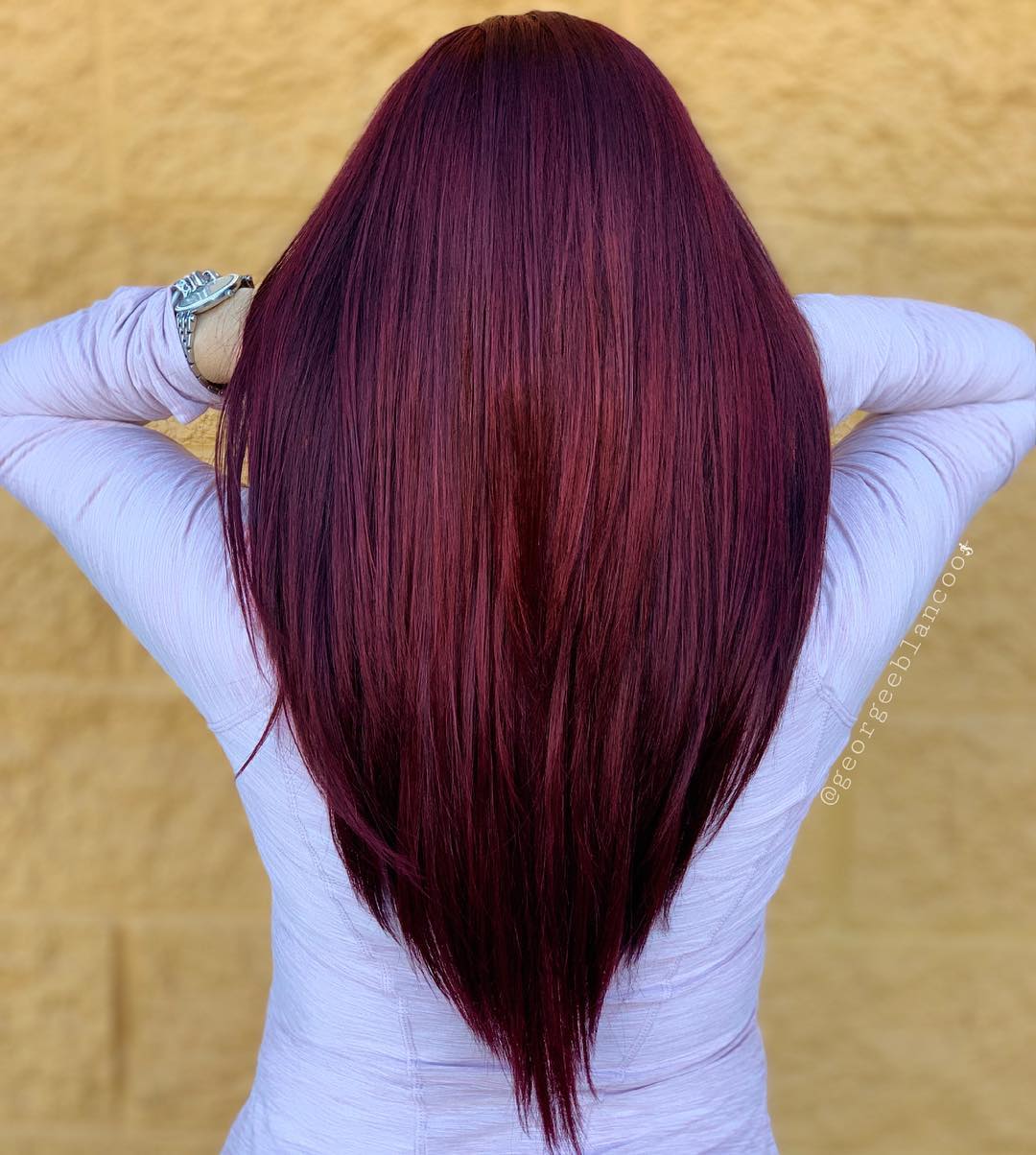 glossy long v cut with rich burgundy hue