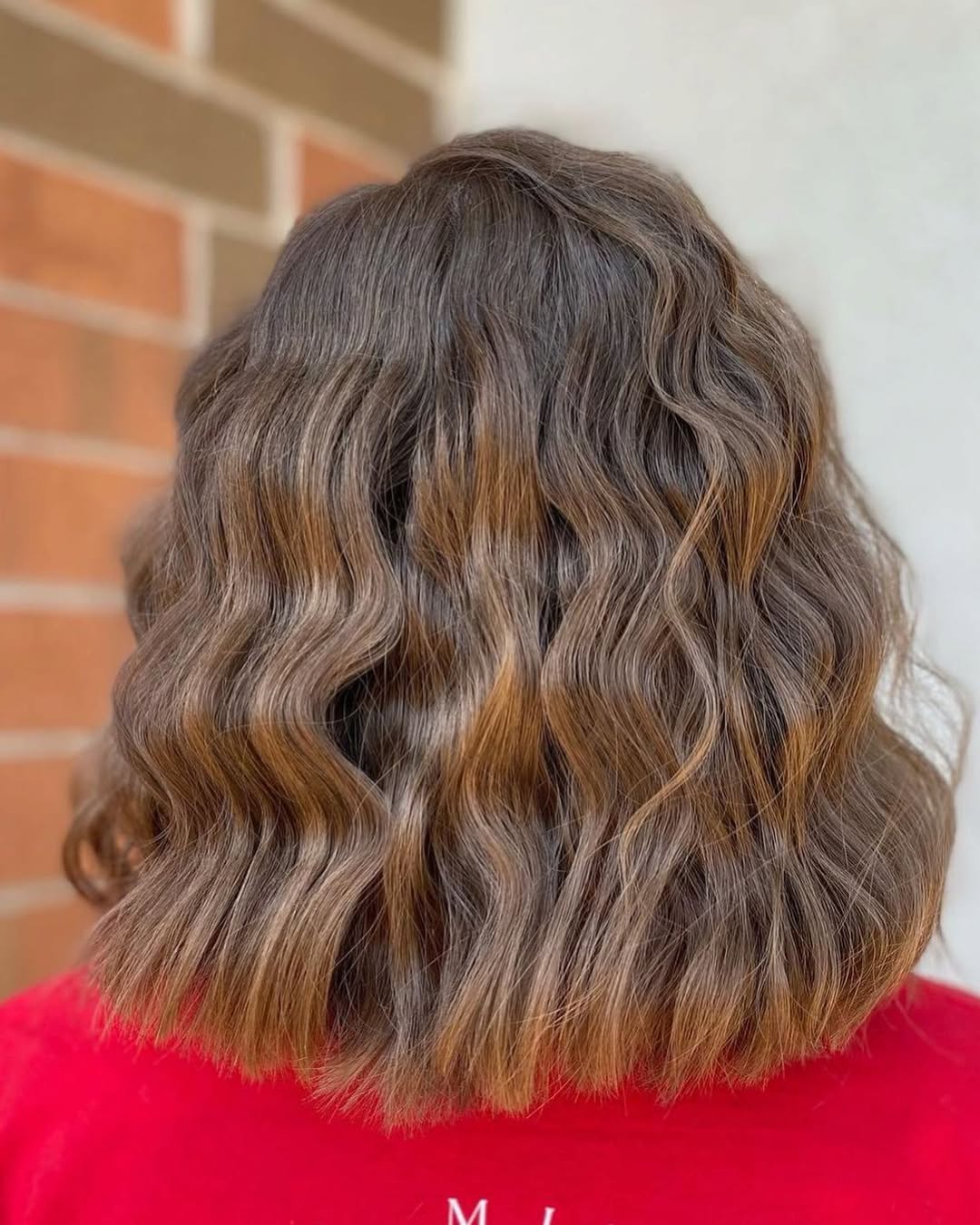 Chic Crimped Lob with Subtle Warm Highlights