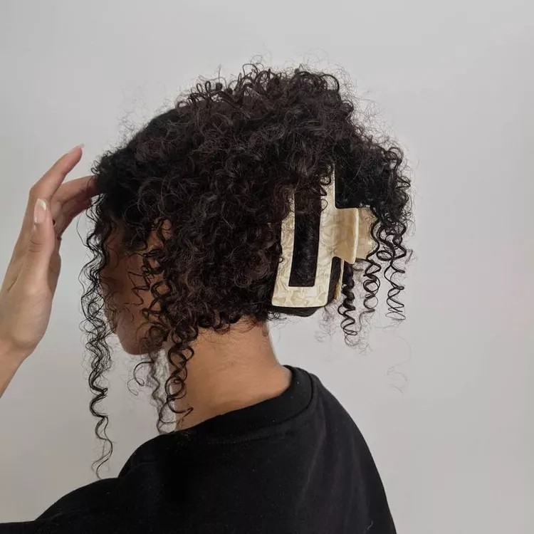 Chic Curly Claw Clip Updo for Long Hair