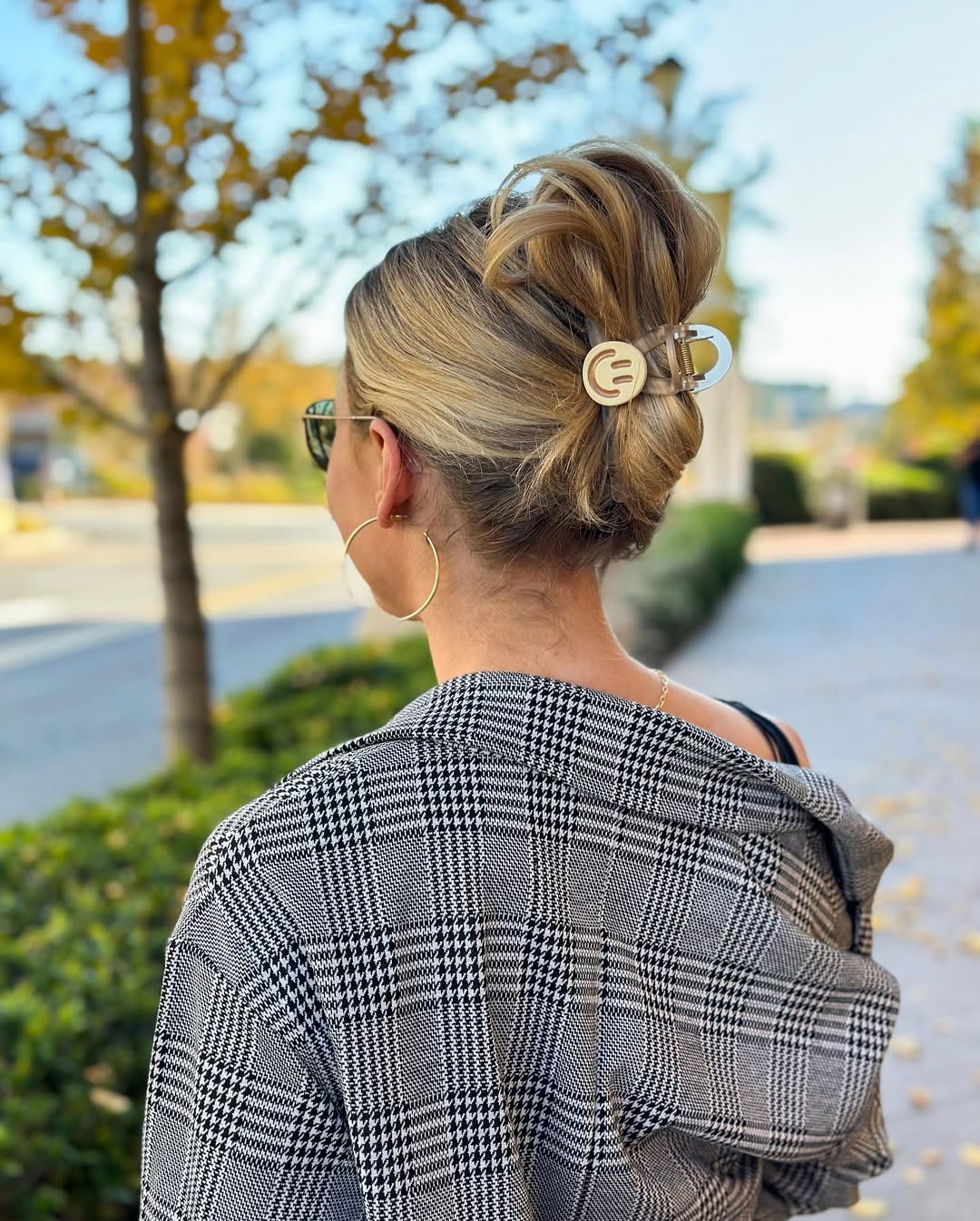Chic High Bun with Claw Clip for Long Hair