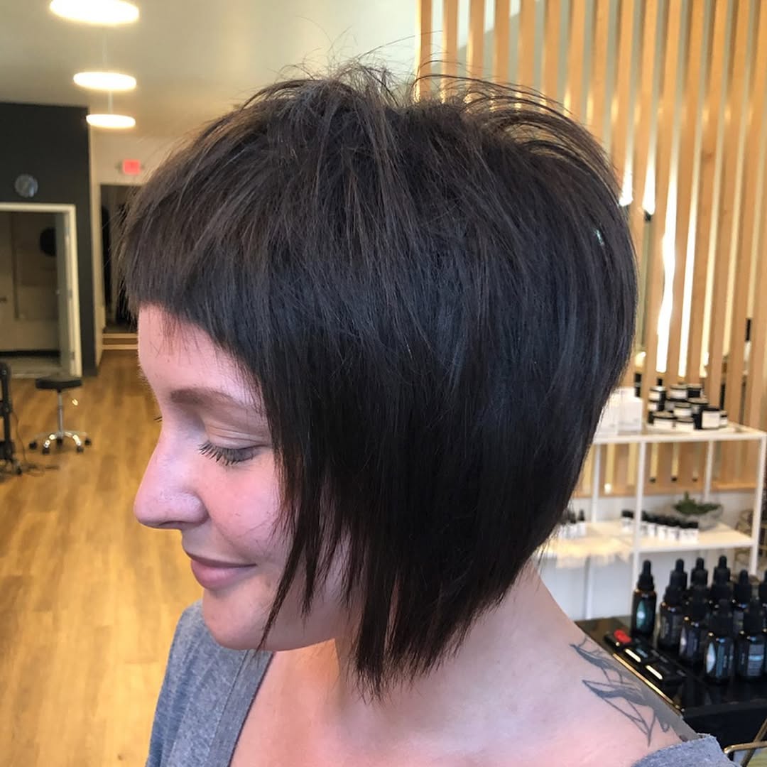 Edgy Textured Baby Bangs with Asymmetrical Bob