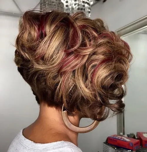 Playful Curly Inverted Bob with Bold Highlights