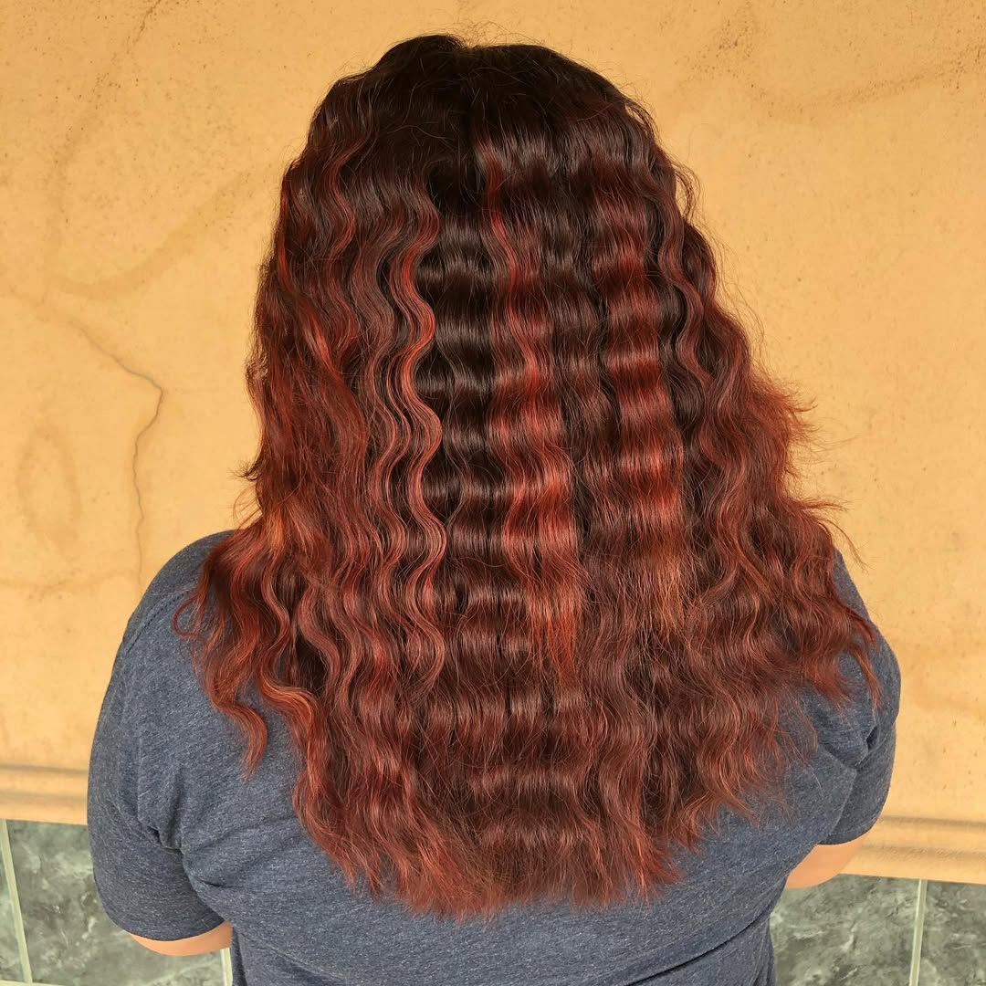 Radiant Crimped Long Hair with Fiery Highlights