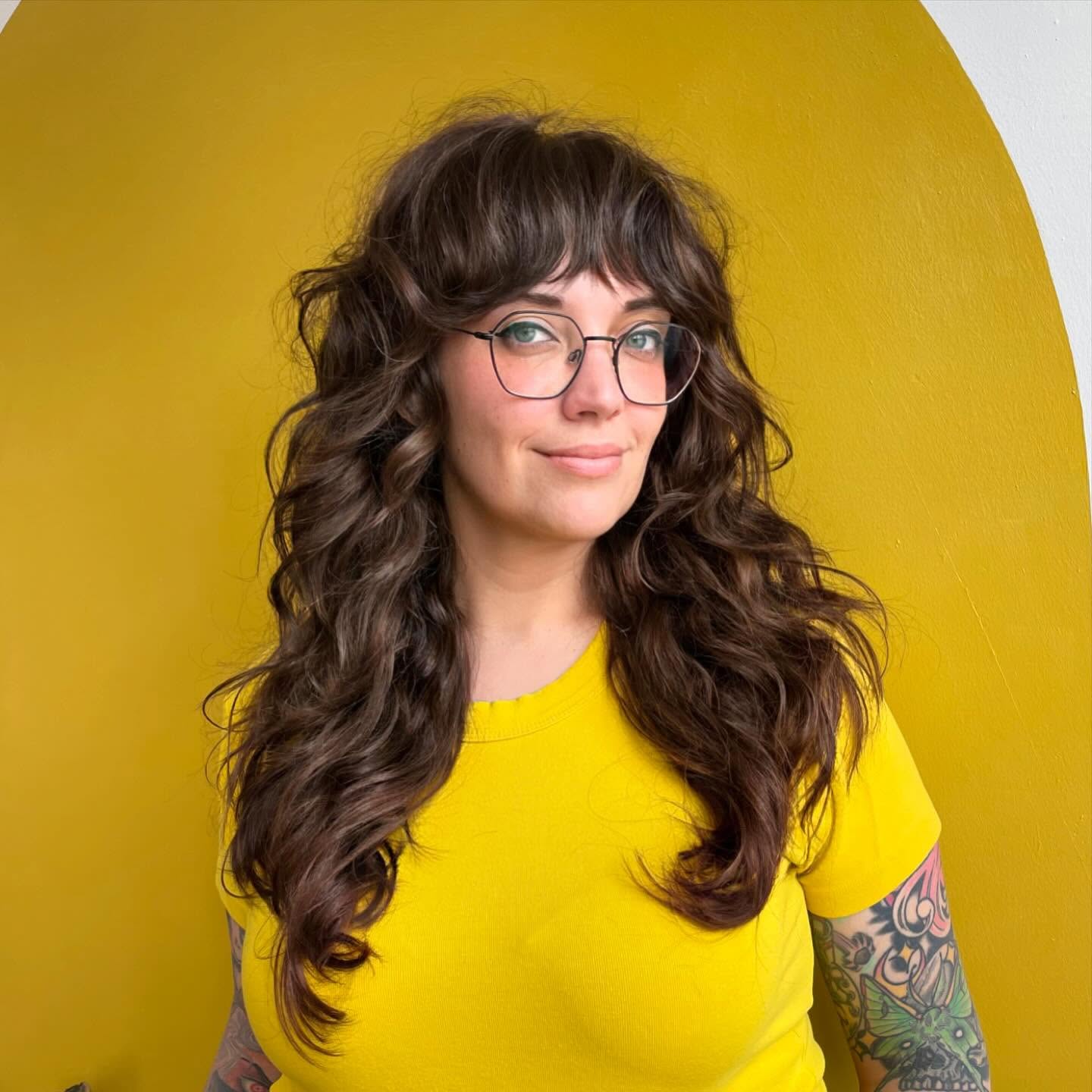 Softly Layered Wavy Shag with Wispy Bangs