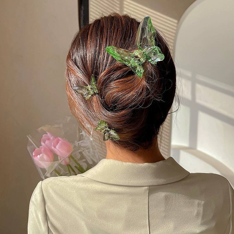 Stylish Twisted Updo with Decorative Claw Clips