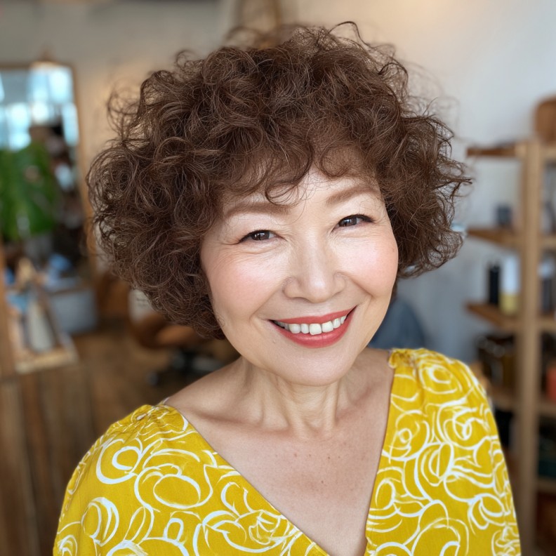 Charming Cinnamon Brown Curly Bob with Defined Volume