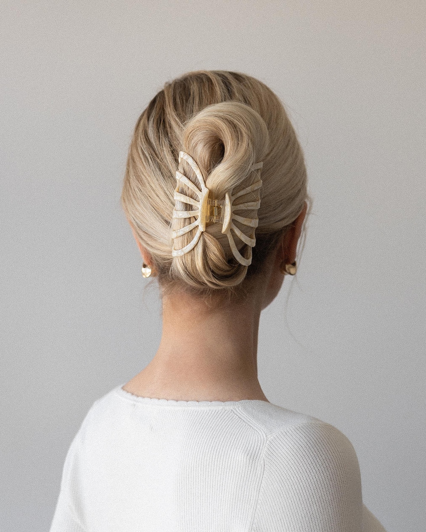 Elegant Twisted Bun with Butterfly Claw Clip