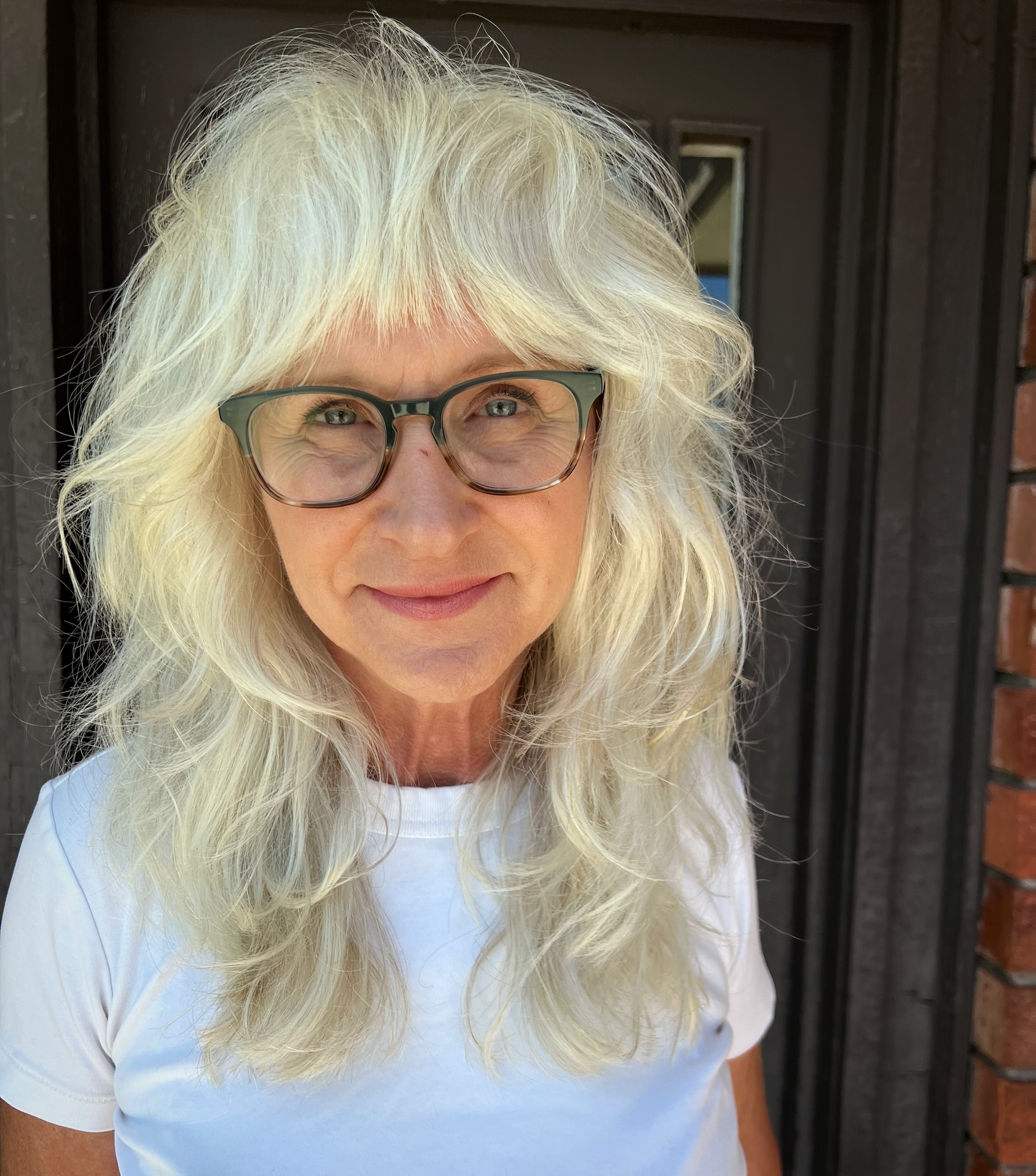 Textured Long Layers with Heavy Bangs
