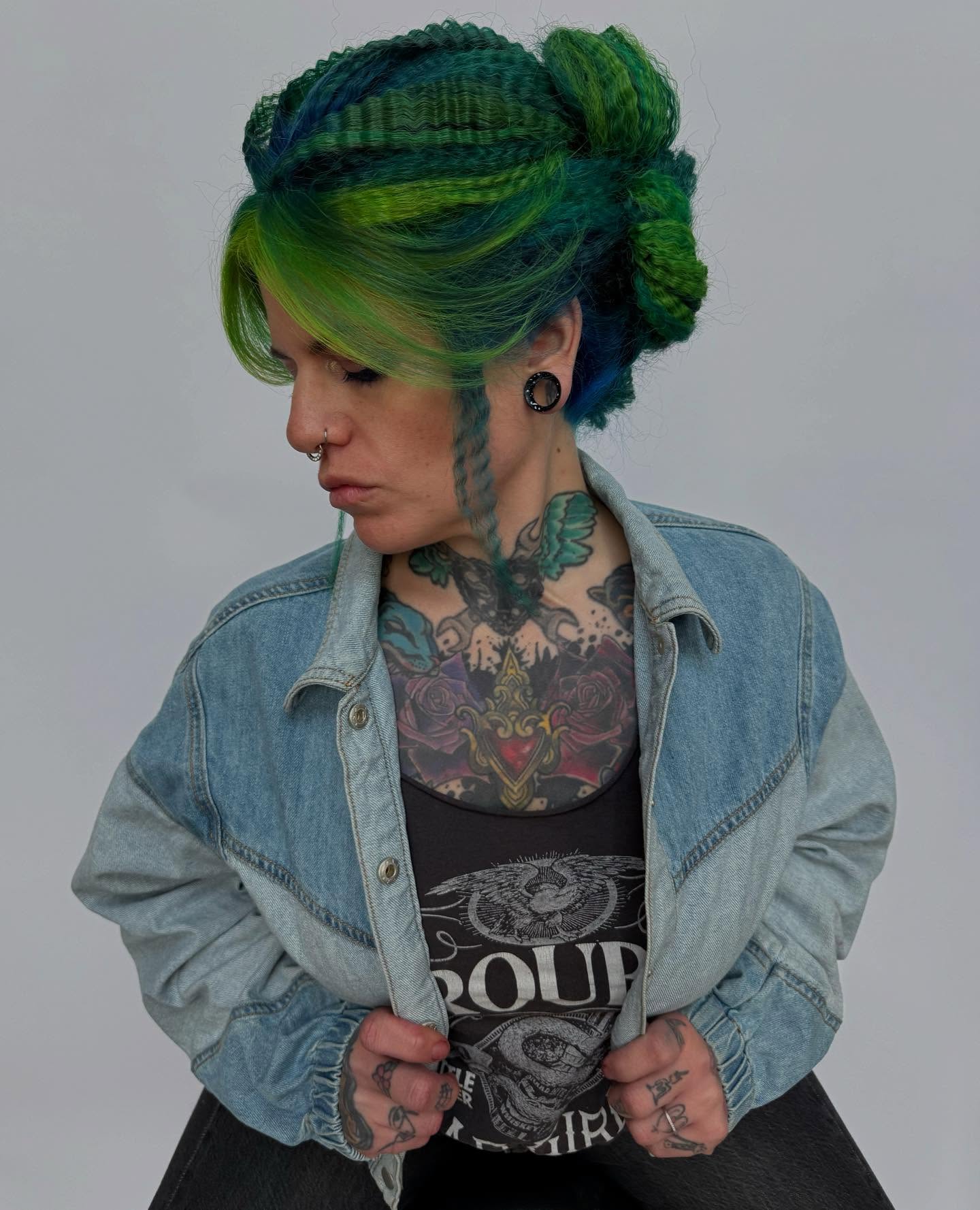 Vibrant Crimped Updo with Playful Green Tones