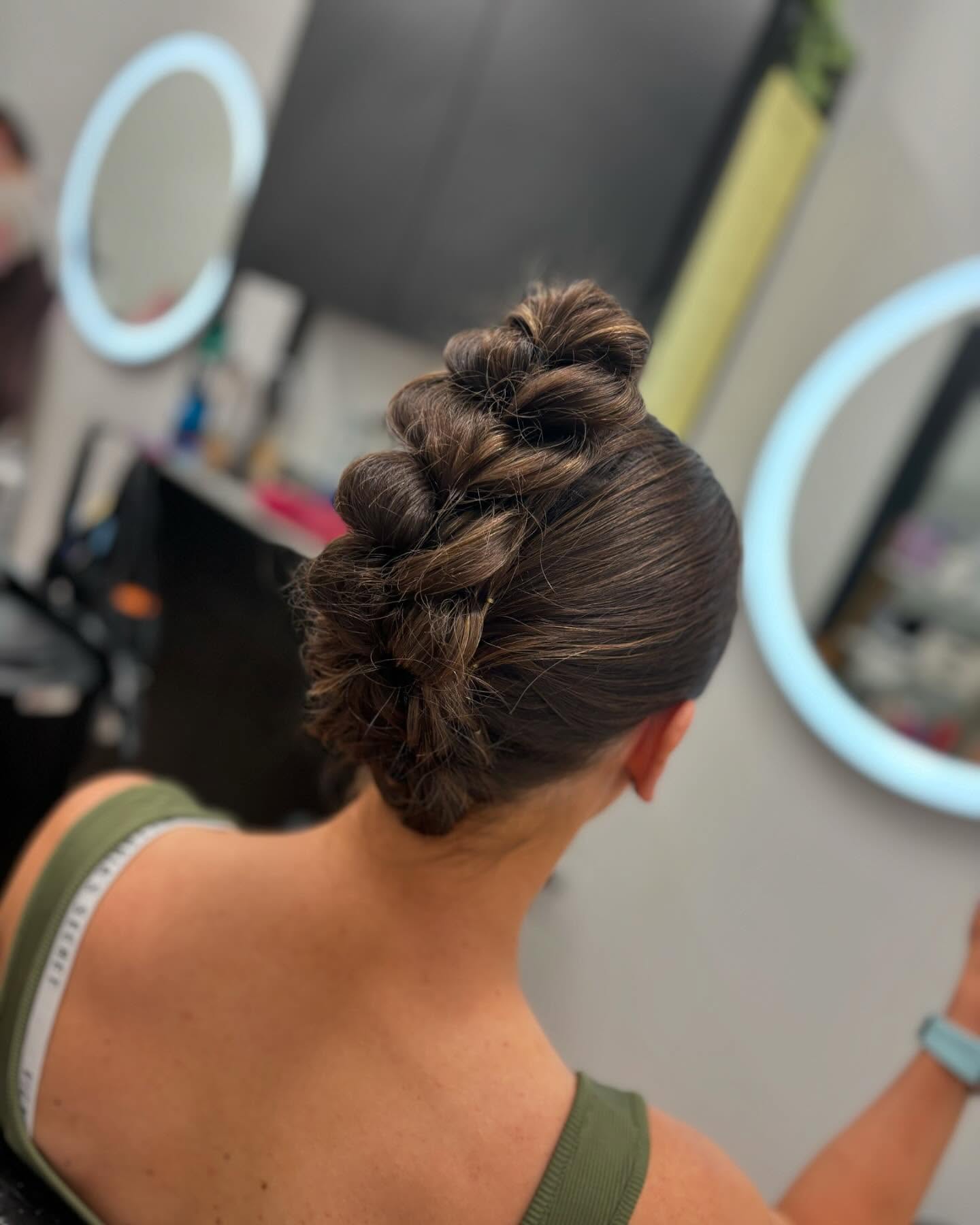 Chic Twisted Braided Updo with Textured Detail