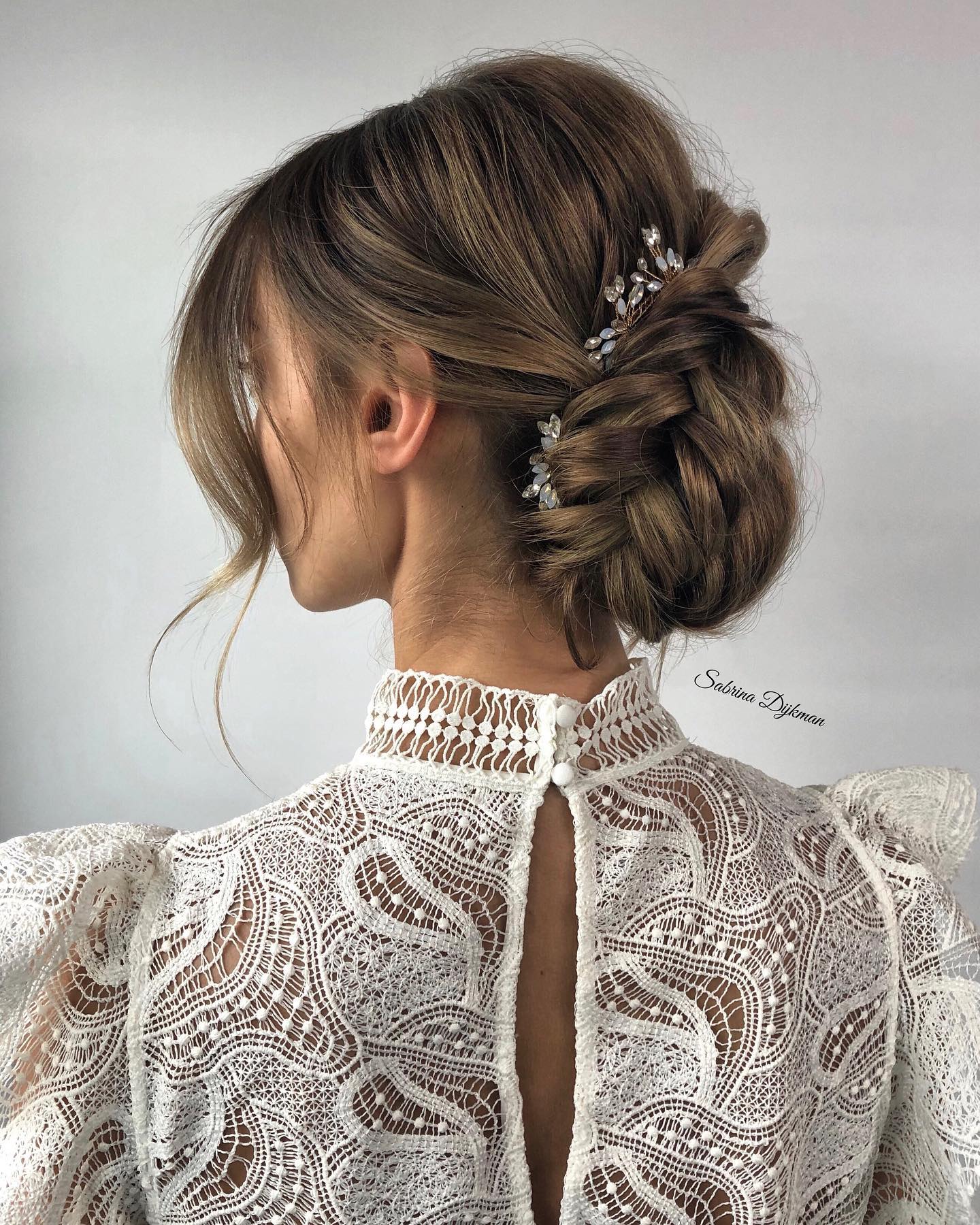 Classic Braided Updo with Delicate Accessories