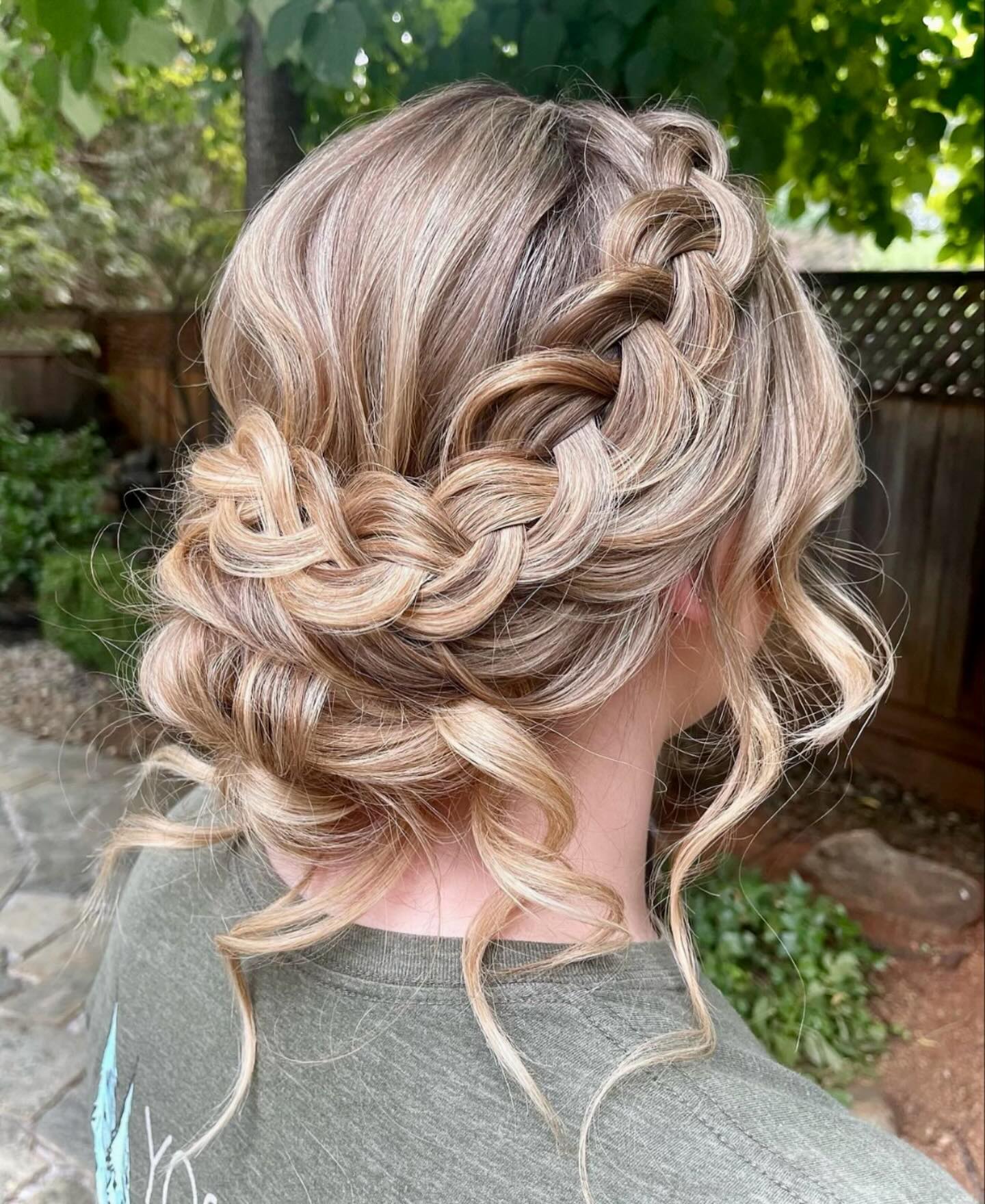 Elegant Braided Updo with Textured Curls