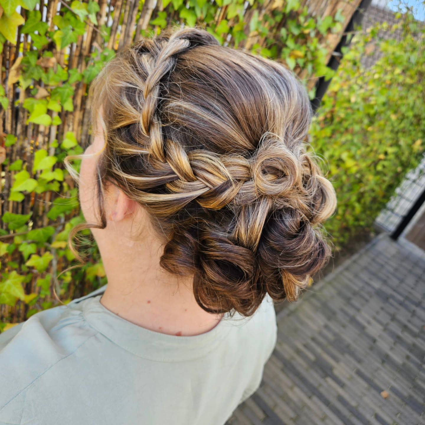 Romantic Braided Updo with Soft Curls