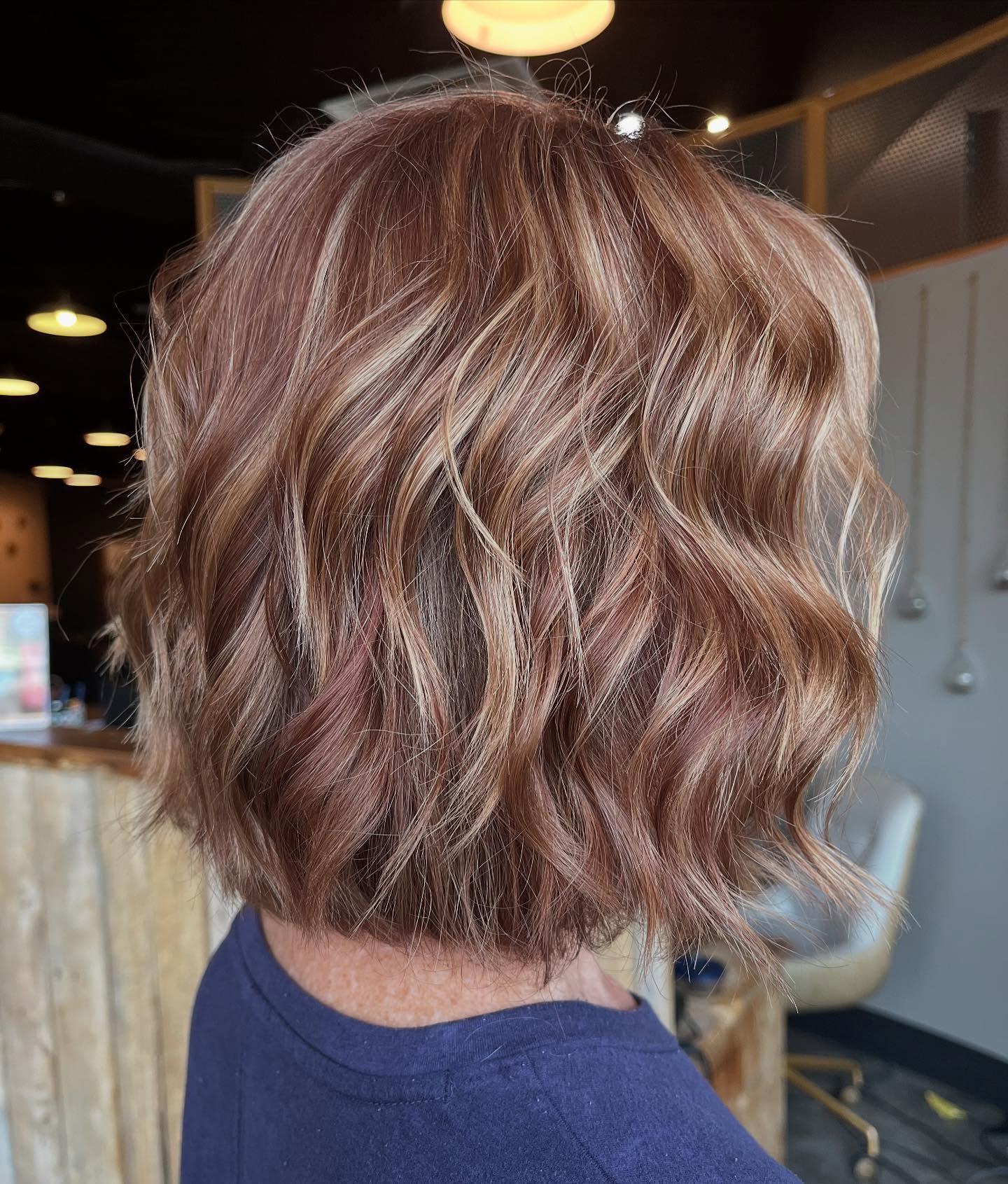 Warm Toned Wavy Bob with Subtle Highlights