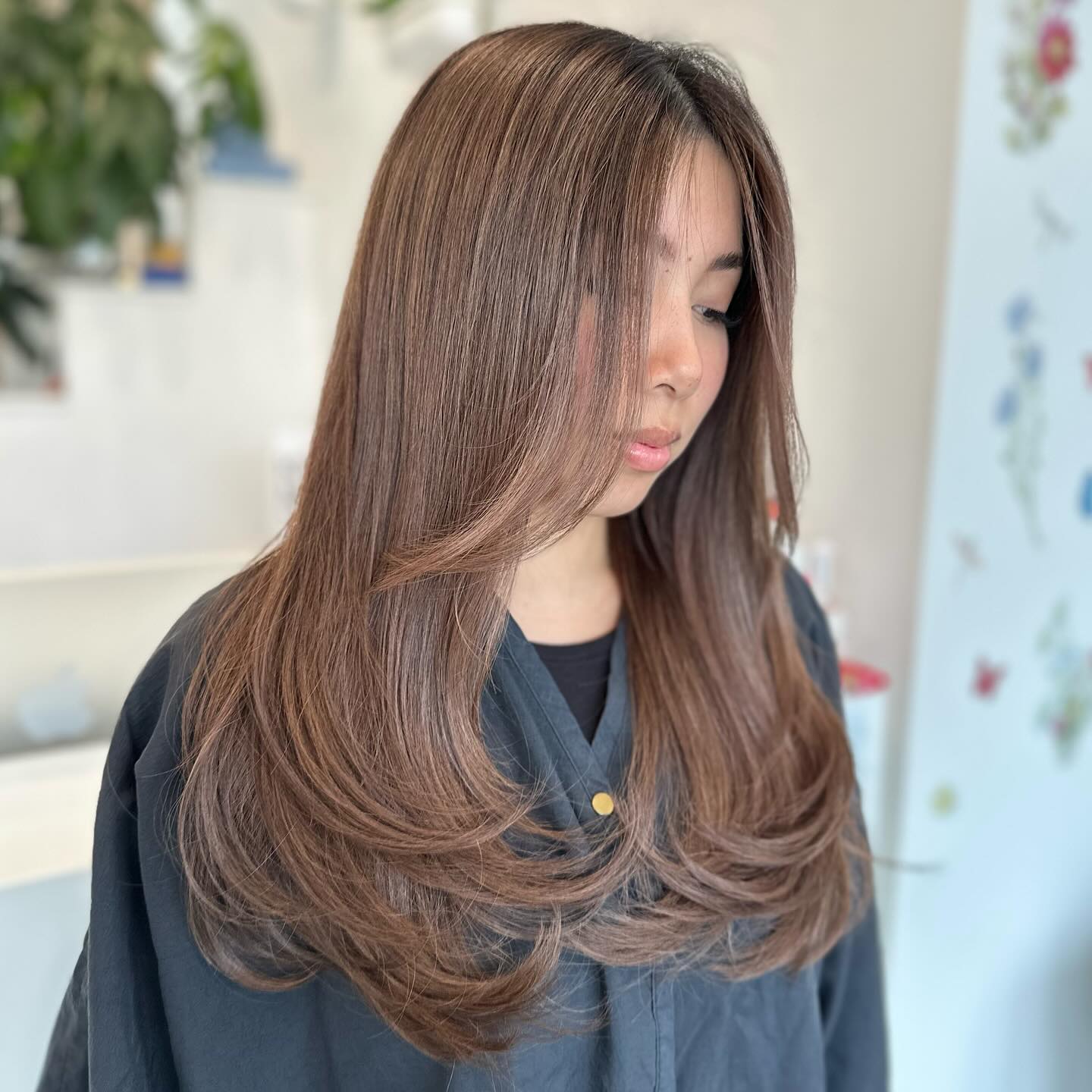 elegant ash brown layers with face framing highlights