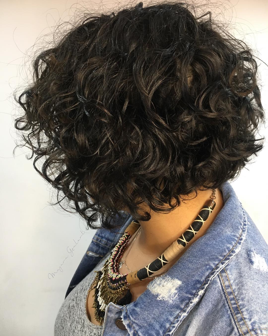 Chic Textured Curly Bob with Defined Volume